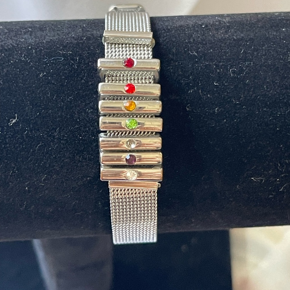 Silver tone adjustable bracelet with colorful gems